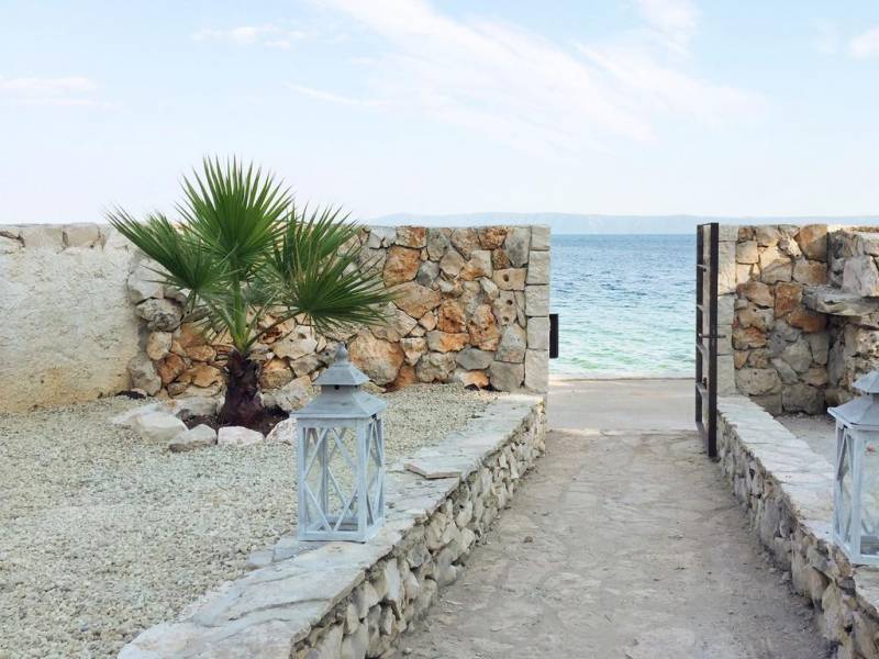Villa Luna with pool, direct at the sea, island Brac, Dalmatia, Croatia 